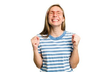 Young caucasian woman cutout isolated celebrating a victory, passion and enthusiasm, happy expression.