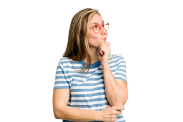 Young caucasian woman cutout isolated thinking and looking up, being reflective, contemplating, having a fantasy.
