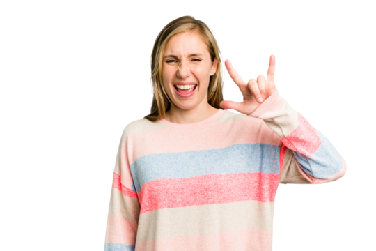 Young caucasian woman cutout isolated showing a horns gesture as a revolution concept.