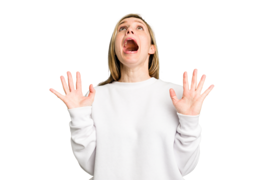 Young caucasian woman cutout isolated screaming to the sky, looking up, frustrated.