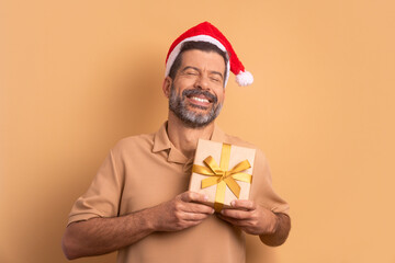 Grateful man receiving Christmas gift