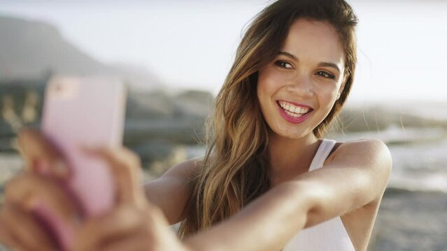 Phone, travel or woman taking selfie at a beach for social media content creation with freedom in Florida. Content creator, influencer or happy girl taking holiday pictures to post on social network