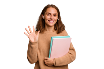 Young student woman holding a books isolated smiling cheerful showing number five with fingers.