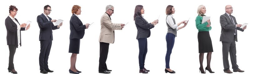 group of people holding tablet and looking ahead