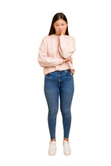 Young asian woman standing, full body cutout isolated who is bored, fatigued and need a relax day.