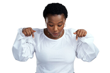 PNG shot of a young woman pointing down while standing. © Shrikant/peopleimages.com