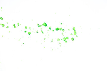 Many Dot droplet of Green juice from nature splash in Air. Water green leaf pour from sky and purify clean natural. Many shape form of water splashing flow over White background Isolated