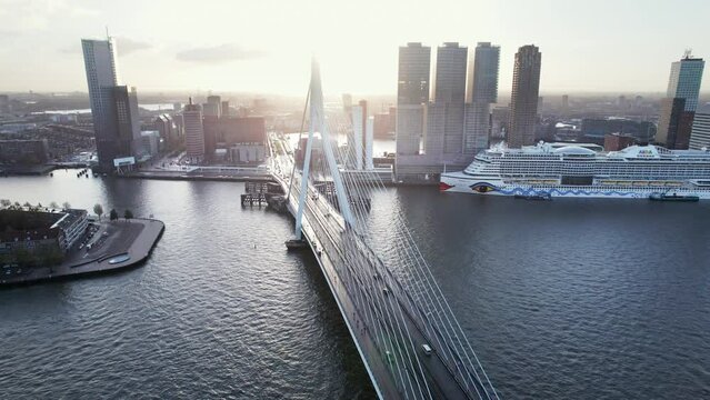 Luxury Cruise Ship Dock At The Bank Of Nieuwe Maas Near Erasmusbrug And Maastoren Rotterdam In The Netherlands. Aerial Drone Shot