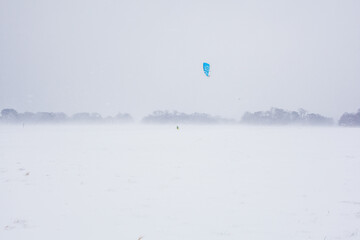 kite surfing in the snow