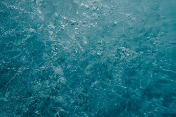 Abstract background of ice texture from ice cave in winter Iceland