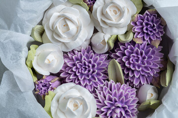 Zephyr bouquet of flowers in a gift box on a light background. Zephyr with a minimum amount of...