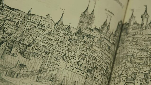 Medieval book, old Nuremberg chronicle with artwork of cityscape, Nuremberg, panning across