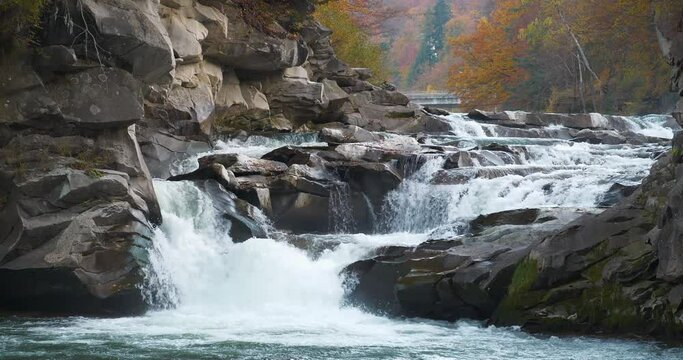 Probiy - waterfall on Prut River in Yaremche City, Ivano-Frankivsk Oblast, Ukraine. Is one of most beautiful and powerful waterfalls of Ukrainian Carpathians. Cinema 4K Slow Motion video with sound