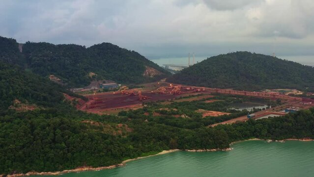 Brazilian company set up iron ore distribution centre in Seri Manjung, Perak, Malaysia as an integral supply chain strategy in Asia Pacific region, aerial shot.
