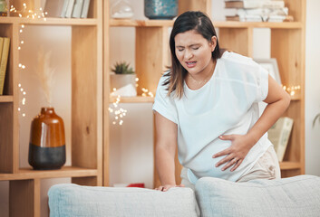 Obraz na płótnie Canvas Pregnant woman, pain and cramps with hand on stomach for abdominal problem, discomfort or childbirth contractions for labour. Female with stress, stomachache or spasm causing miscarriage in pregnancy