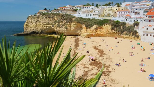 Revealing shot of the beautiful Carvoeiro beach in Algarve, Portugal