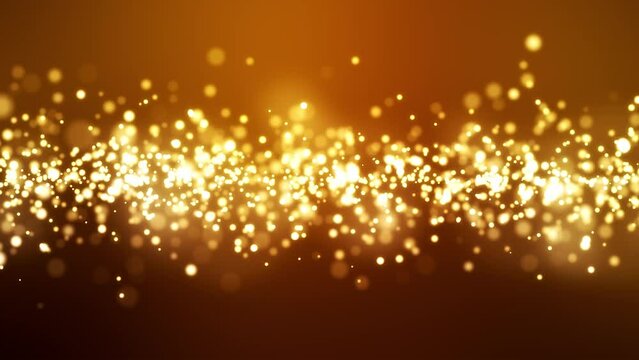Video animation of light particle bokeh over golden background - abstract background - seamless loop - christmas and vacation concept