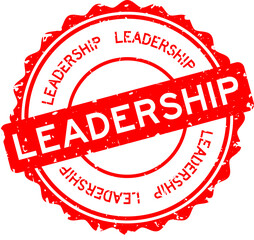Grunge red leadership word round rubber seal stamp on white background