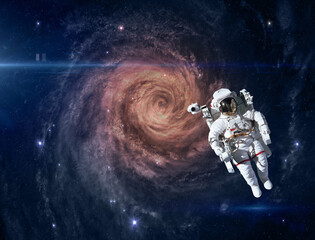 Obraz na płótnie Canvas Astronaut and alien spiral galaxy. This image elements furnished by NASA.