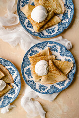 homemade russische crepes on blue english plate