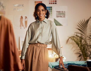 Fashion designer, black woman and portrait of a design workshop and creative studio worker. Smile,...