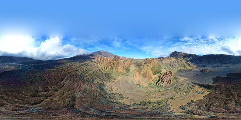 360 degrees panorama of unique Roque Cinchado rock formation with famous mountain peak Teide volcano in the background.