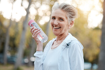 Exercise, senior woman and water bottle for fitness, workout in nature or portrait. Mature female, elderly lady and hydration for wellness, health and training outdoor for cardio, retirement or relax