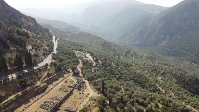 Drone panning shot of Delphi Oracle. Pytho, Pythia, Greece.