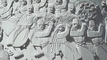 Antique Chinese Stone Carving Relief In Urumqi, Xinjiang, China. closeup