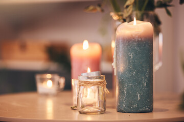 Candles, zen and spa wellness aromatherapy for zen, relax and luxury experience for a massage. Fire, care and physical therapy room with calm, balance and beauty atmosphere in a salon with no people - Powered by Adobe