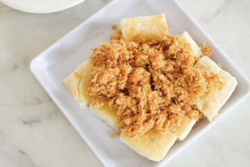 Flossed pork bread on a plate 