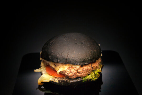 Delicious gourmet Angus beef burger. Mouth watering tasty and juicy burger.