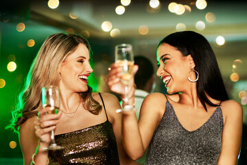 Party, girl friends and champagne cheers with nightclub dancing and happiness of women. Dj music, alcohol drinks and cocktail toast at a new year event with bokeh lights and smile with glasses © C Malambo/peopleimages.com