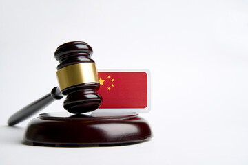 Legal law concept image, judge gavel and flag of China