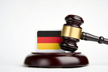 Legal law concept image, judge gavel and flag of Germany