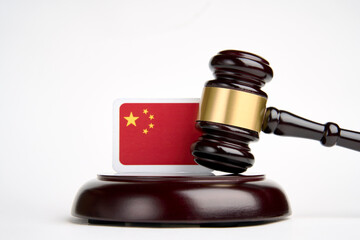 Legal law concept image, judge gavel and flag of China