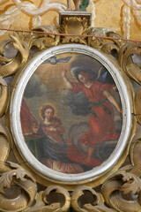 Fototapeta na wymiar Annunciation of Mary, altarpiece on the altar of the Holy Trinity in the parish church of Our Lady of Sorrows of Carinthia in Krizevci, Croatia
