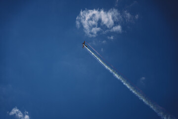 airplane flying over the clouds