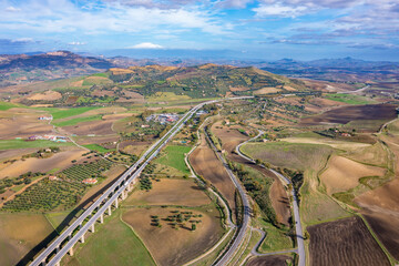 Naklejka premium Amazing view from a drone of a landscape with a highway.