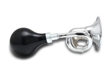 Shiny metal bulb trumpet or bike horn isolated on white background.
