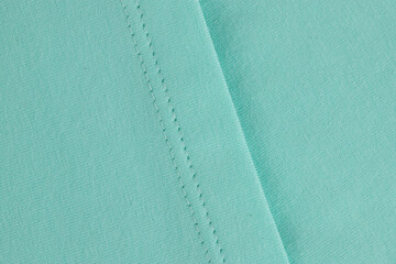 knitwear textile, machine stitching, sewing knots