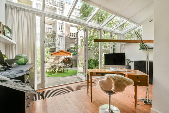 Modern Home With Furniture next to a window