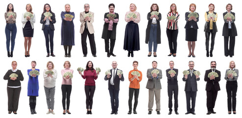 group of successful people with money in their hands looking at the camera