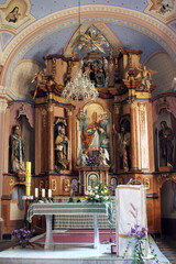 Fototapeta na wymiar Main altar in the parish church of St. Martin in Martinska Ves, Croatia