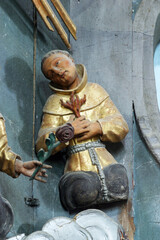 Naklejka premium Statue of Saint on the altar of Fourteen holy helpers in the church of St. Catherine of Alexandria in Krapina, Croatia