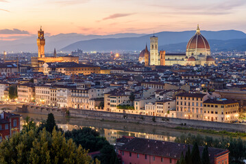 Fototapeta na wymiar Classic Florence cityscape with Duomo cathedral and Palazzo Vecchio over city center at sunset, Italy