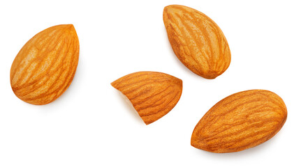 Almonds isolated on white background. Almond nut raw pieces flat lay. Top view.