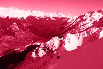 Snow-capped mountain peaks. Natural background. Ski resort Caucasus Mountains nature and sports.