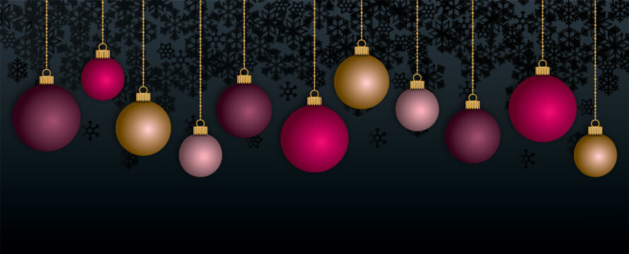 Merry Christmas banner with coloured Christmas balls on dark background