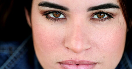 Obraz premium Young woman face smiling at camera, macro close-up happy girl